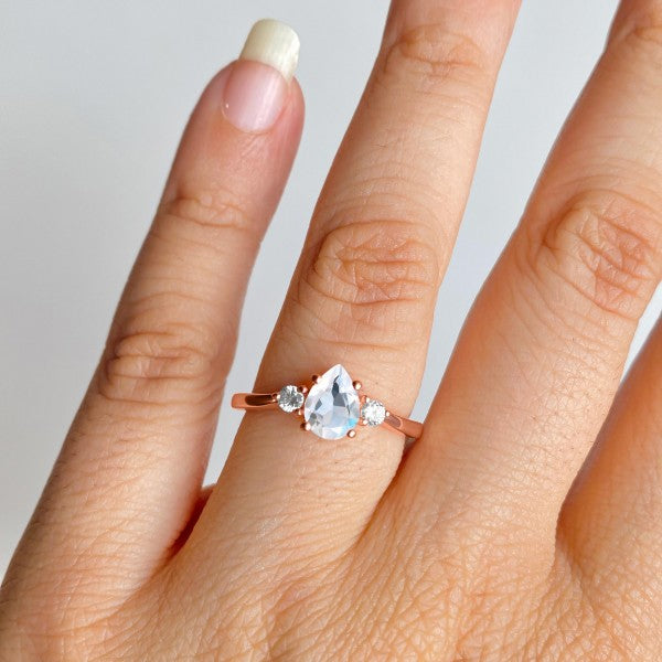 Delicate Moonstone Ring with White Topaz Side Stones | Embrace Romance, Intuition, and Elegance