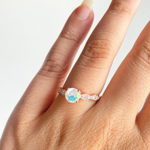 Opal Ring with White Topaz Accents